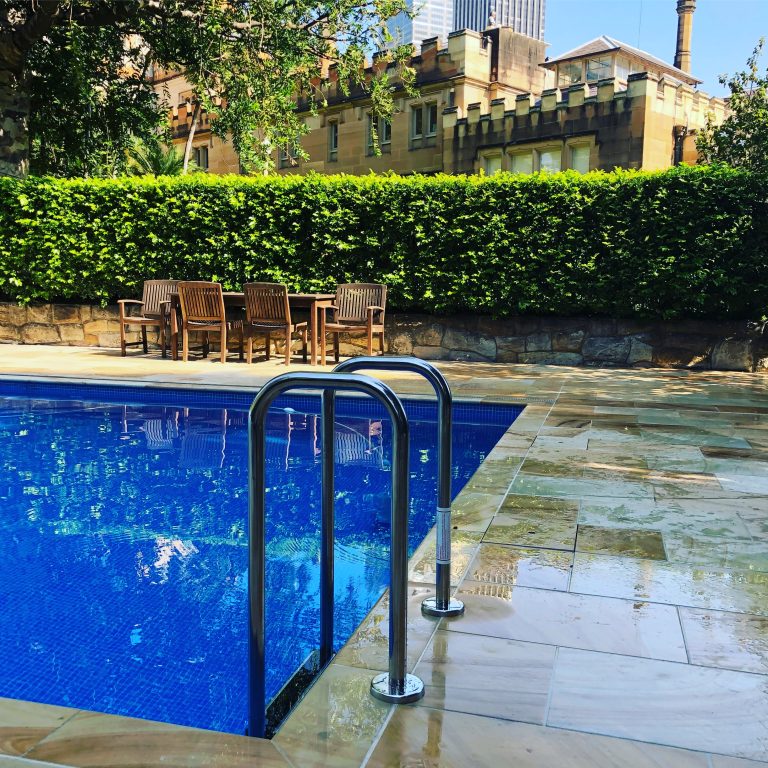 Professional pool maintenance and servicing equipment setup for ongoing residential pool care