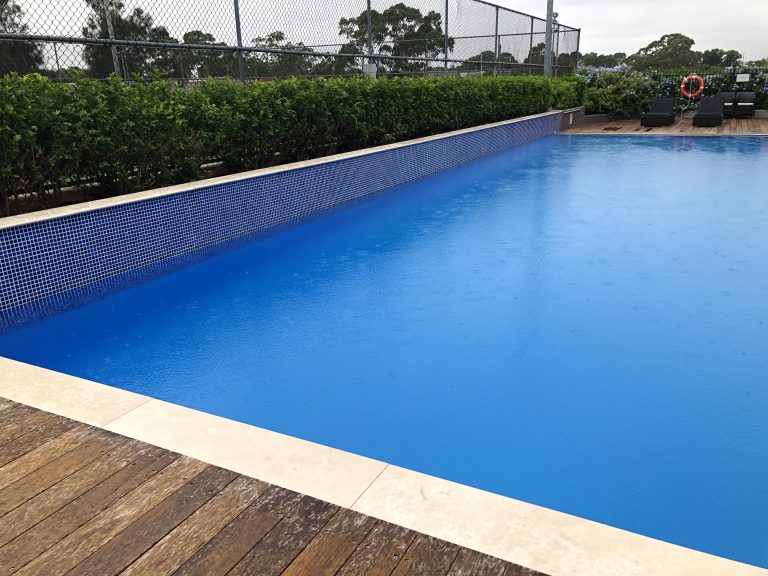 Modern infinity edge residential swimming pool