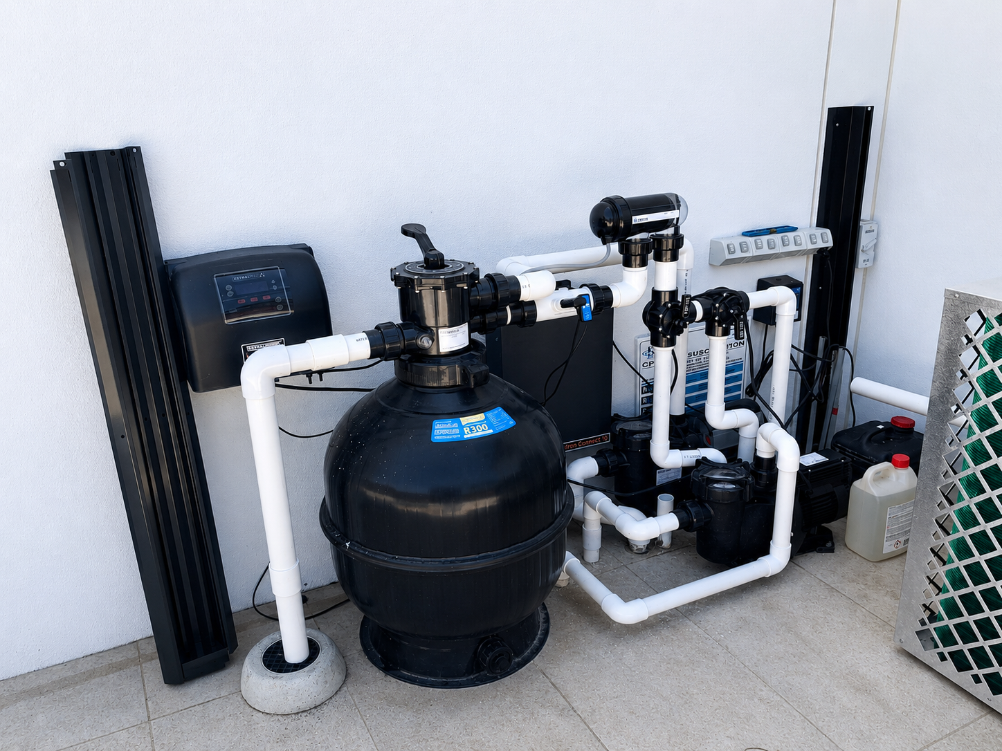 Pool filtration equipment setup with integrated plumbing and automation system for residential pool operation